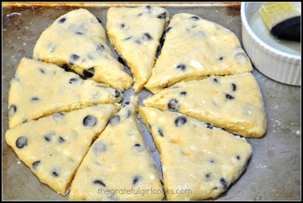 Scone dough is cut into 8 pie shaped wedges