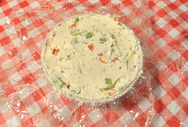 Ingredients for Mom's famous cream cheese ball are packed into ramekin.