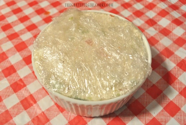 Ramekin with Mom's famous cream cheese ball is tightly wrapped, then refrigerated overnight.