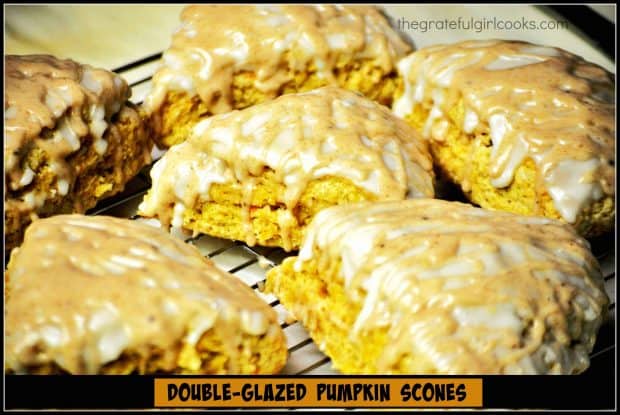 Fall is here, and it's time to enjoy delicious Double Glazed Pumpkin Scones (a Starbucks copycat recipe), with cinnamon spiced and powdered sugar glazes!