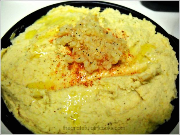 Hummus, with minced garlic and paprika garnish is ready to serve!