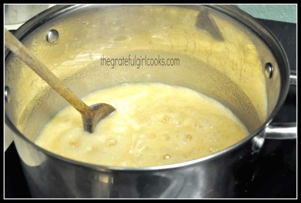 Evaporated milk and sugar are boiled to add to the old fashioned fudge ingredients.