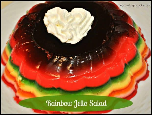 A few boxes of jello, evaporated milk and water are all you need to make this colorful and delicious holiday rainbow jello salad for a crowd!