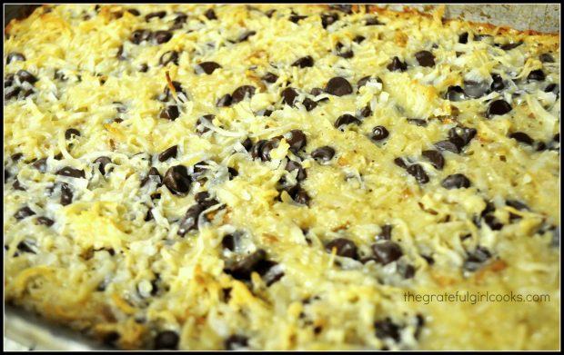 A pan full of fresh baked sprinkle bars, ready to cut into pieces.