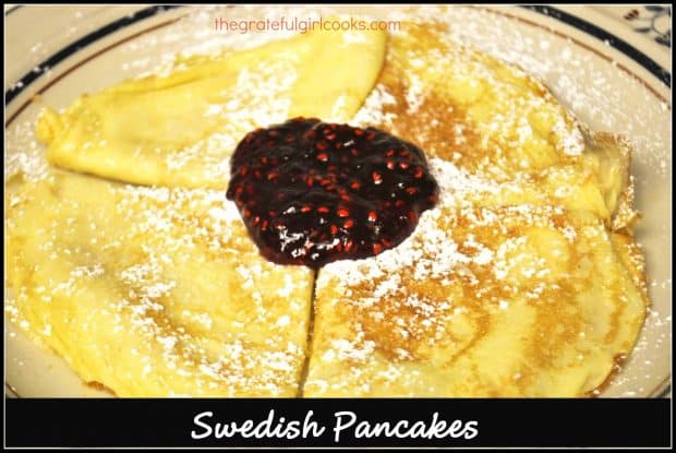 Swedish pancakes are a delicious breakfast treat! Thin crepe-like pancakes are buttered, dusted with powdered sugar and a dollop of raspberry jam. 