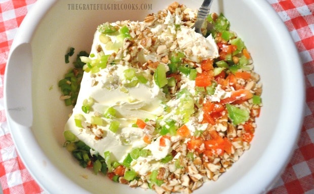 The ingredients for Mom's famous cream cheese ball are placed in mixing bowl.