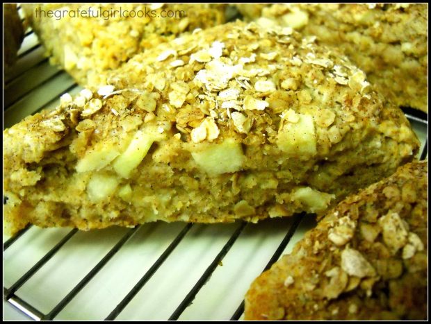 Close up of baked apple cinnamon scone on wire rack