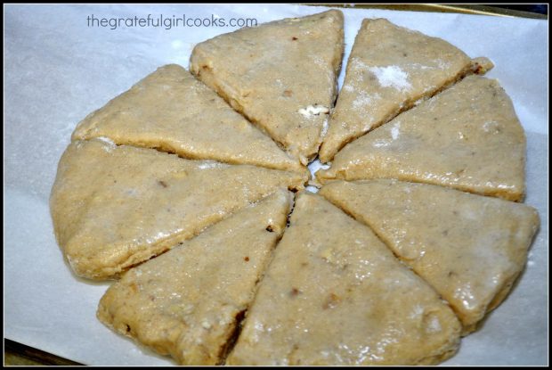 Scones divided into 8 wedges on parchment paper