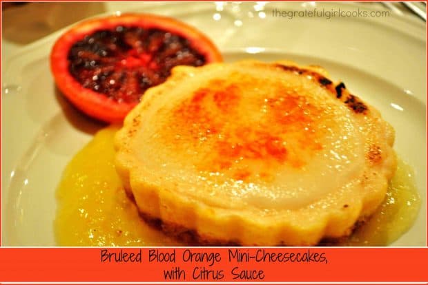 Blood Orange Mini-Cheesecakes are decadent treats, with a graham base, orange/cheesecake filling, ricotta glaze, bruleéd topping and a citrus sauce!