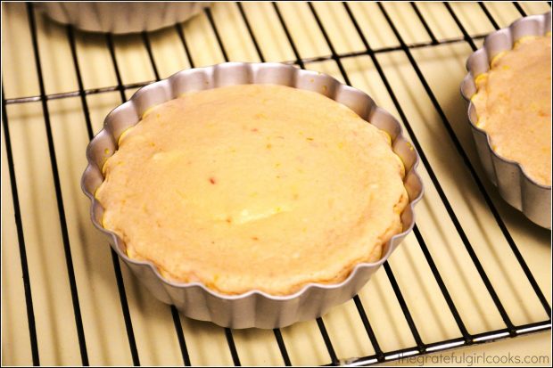 The cheesecake topping has been baked, and is cooled completely before removing from pan..
