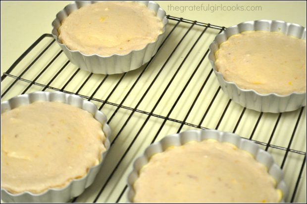 Let the cheesecakes cool completely on a wire rack before removing from pans.