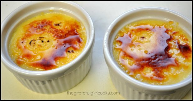 The sugar has been browned and forms a crackable crust on top of the creme bruleé.