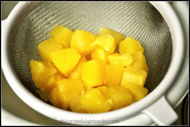 Pineapple is drained, and sauce is reserved for Hawaiian meatballs.