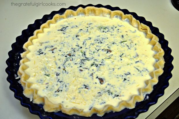A whipping cream and egg mixture is added to the quiche filling.