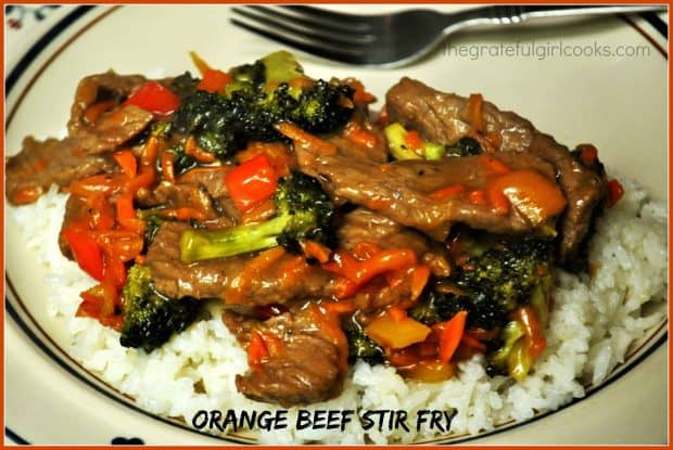 Enjoy an Orange Beef Stir Fry, with marinated steak cooked with broccoli, carrots and red bell peppers, in an Asian-inspired soy and marmalade sauce!