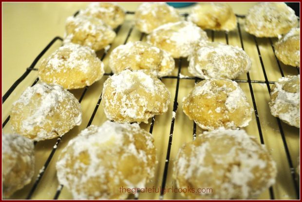 Snowball cookies, cooling on a wire rack.