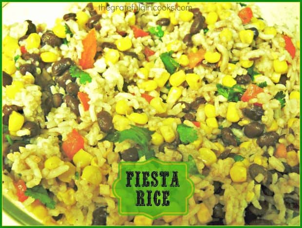 Fiesta Rice is a totally EASY, hearty, and delicious side dish made with white rice, black beans, corn, tomatoes, scallions, cilantro and lime juice.