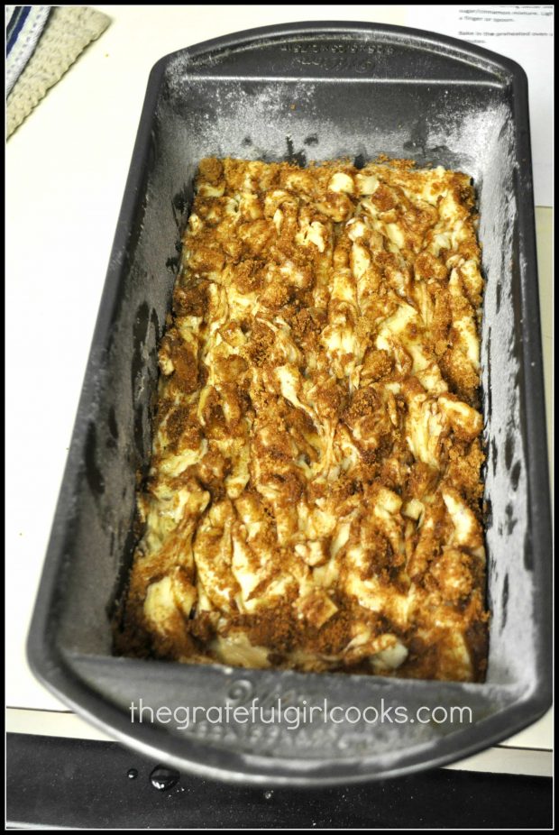 Apple bread batter in a metal loaf pan