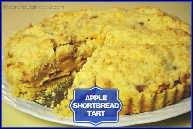 Delicious Apple Shortbread Tart features apples in a brown sugar/cinnamon sauce on a buttery shortbread crust , topped with a crumbly streusel. SO GOOD!