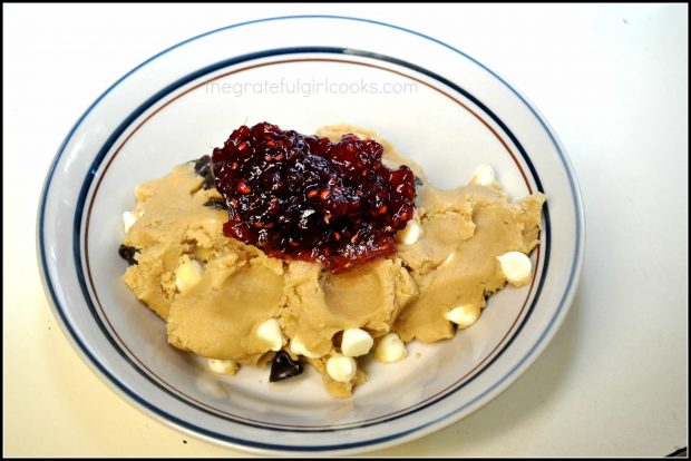 Raspberry jam is added to a portion of the cookie dough.