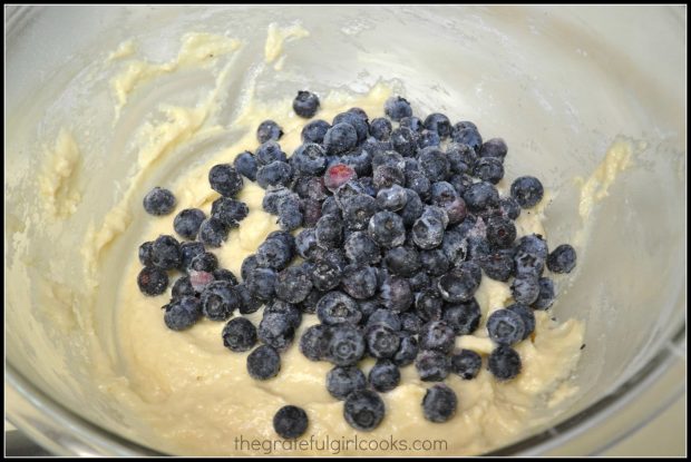 Frozen blueberries are added to muffin batter.