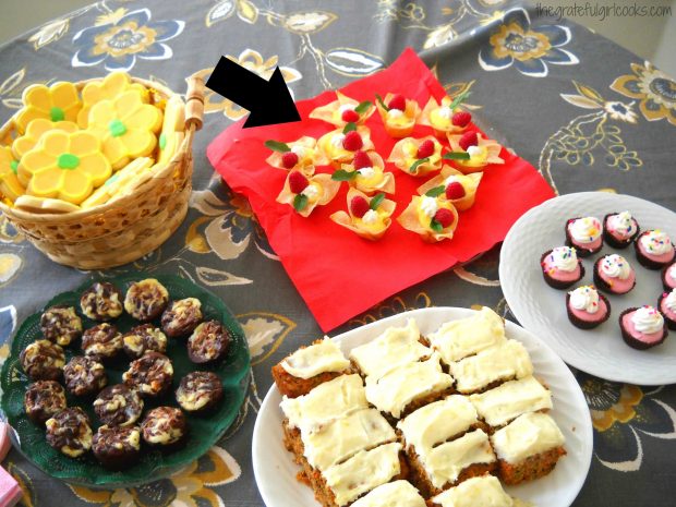 Desserts on table, including lemon curd filled won ton cups