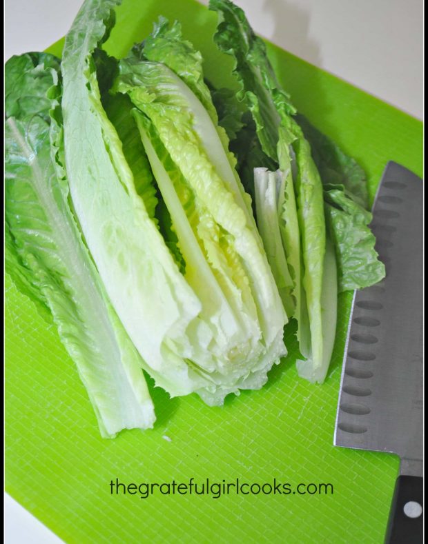 Romaine lettuce is chopped for the Greek salad.