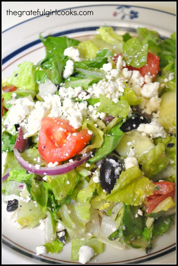 Traditional Greek salad is served on plate!