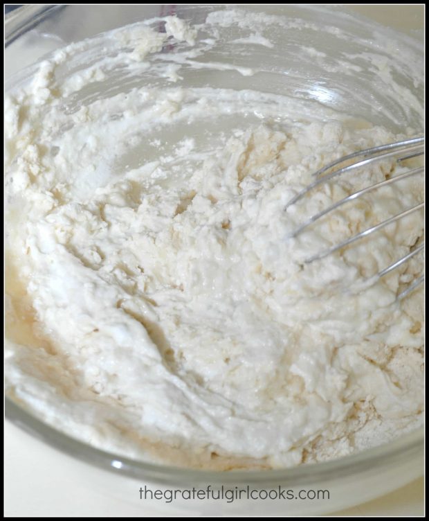 Mixing batter from scratch for homemade blueberry pancakes