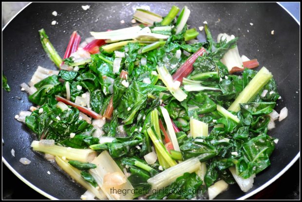 The Swiss Chard With Onions And Garlic is finished cooking, and is ready to serve.