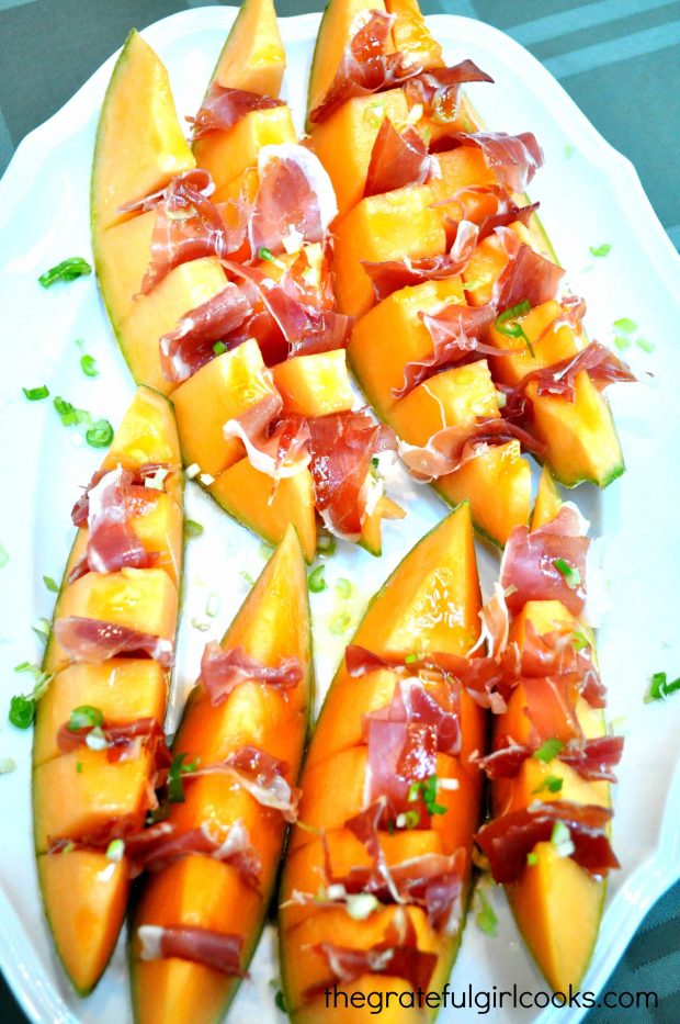 Melon con Proscuitto, served on a platter, is a great appetizer.