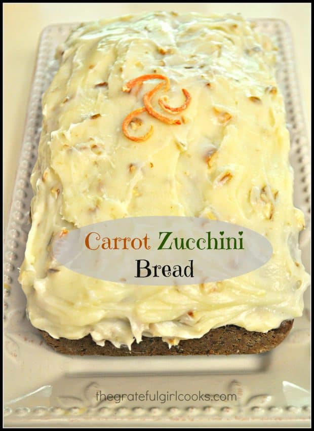 Carrot Zucchini Bread is a wonderful tasting loaf of sweet bread, topped with a cream cheese and pecan frosting! This easy to make recipe yields two loaves!