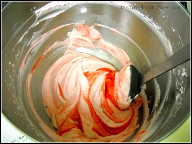 Raspberry puree is added to whipped mousse filling for chocolate dream cups.