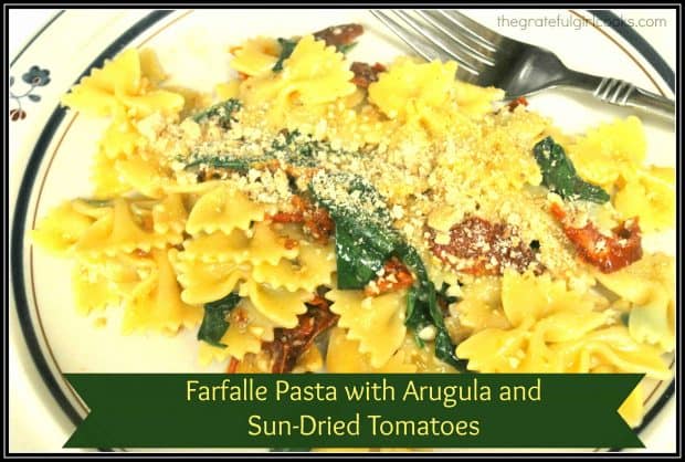 Farfalle Pasta with Arugula and Sun-Dried Tomatoes is a delicious dish, cooked in a skillet and topped with Parmesan cheese and breadcrumbs!