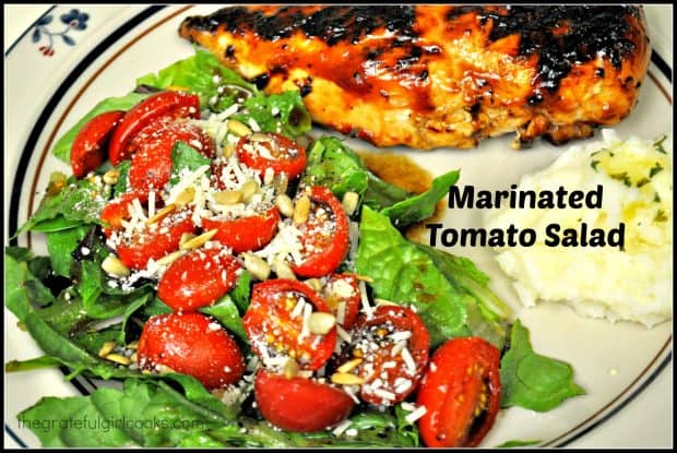 You'll enjoy this marinated tomato salad, featuring cherry tomatoes in a balsamic/honey sauce, on mixed greens garnished with pine nuts and Parmesan cheese!