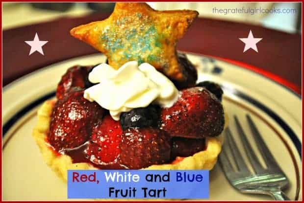 Enjoy this patriotic fruit tart, with fresh strawberries, blueberries and whipped cream in a pastry crust, topped with strawberry glaze. 