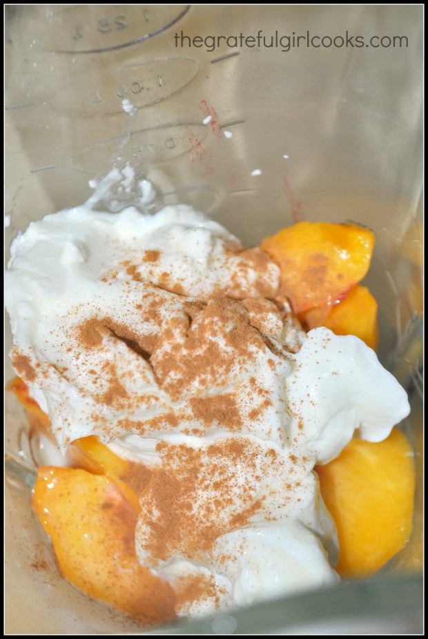 Vanilla yogurt and cinnamon for smoothie added to peaches in blender