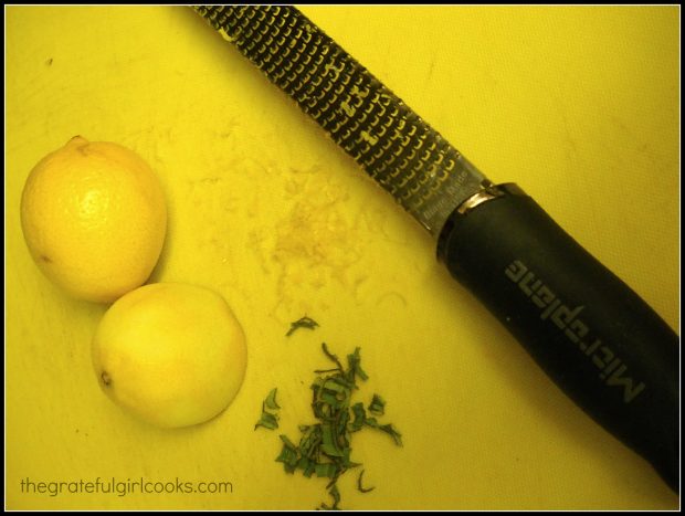 Grated lemon zest and sliced sage leaves to add to the sauce for the ravioli.