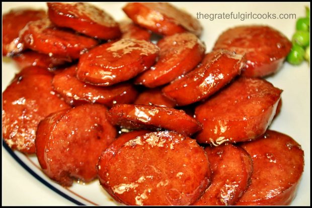 Close up photo of the sweet n' sticky polska kielbasa slices on plate.