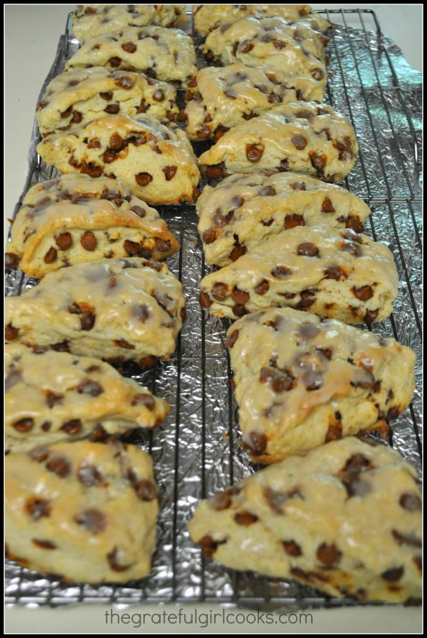 Cinnamon Chip Scones are baked, cooled, then covered with a glaze icing.