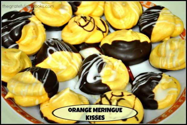 Light, airy and crisp, these chocolate dipped Orange Meringue Kisses are a fancy "cookie" you will enjoy! Easy prep, and a long, low temp. bake time.