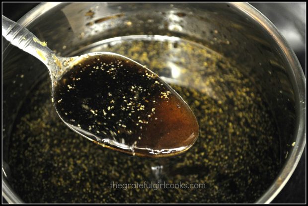 Lemon sauce and spoon in small bowl