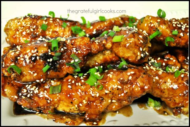 Lemon chicken strips garnished with green onions