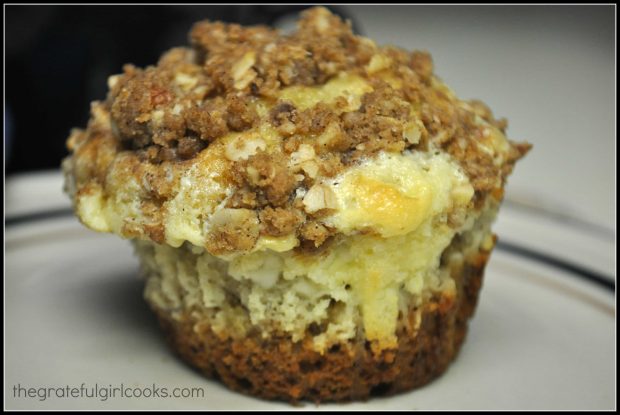 Side view of banana crumb muffin on plate 