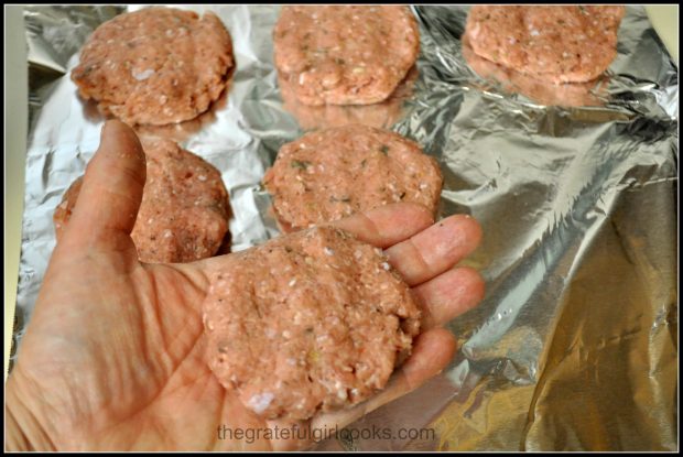 Breakfast sausage patties formed in palm of hand