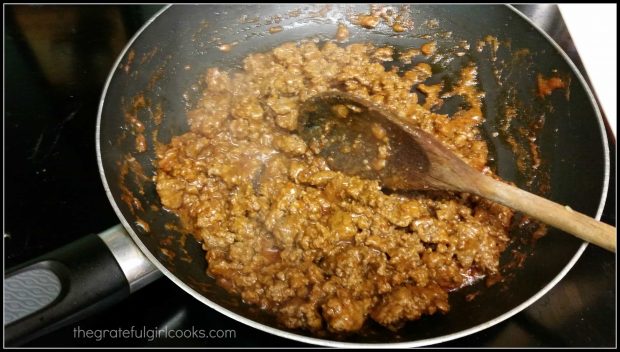 Cooking the seasoned meat in a skillet, for tacos.