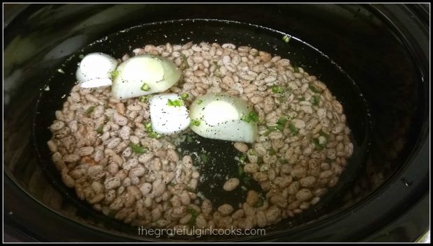 Refried beans cook in crock pot all day.