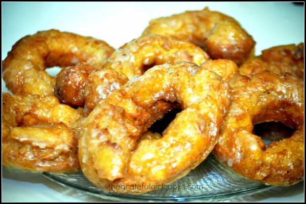 Glazed Pumpkin Buttermilk Doughnuts are done cooking, are glazed, and ready to eat!