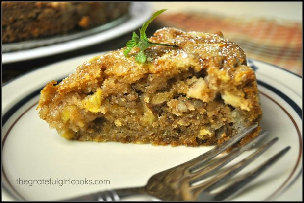 A piece of Mom's apple cake, on a plate, ready to eat!