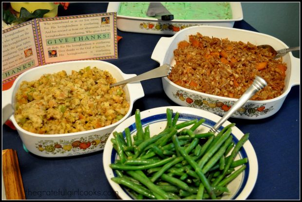 Easy cornbread stuffing is served, along with green beans, yams, and jello salad.